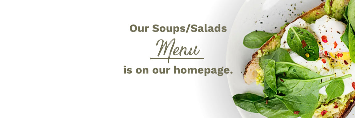 Plate of salad with avocado and bread on a white background, text overlay about soup and salad menu.